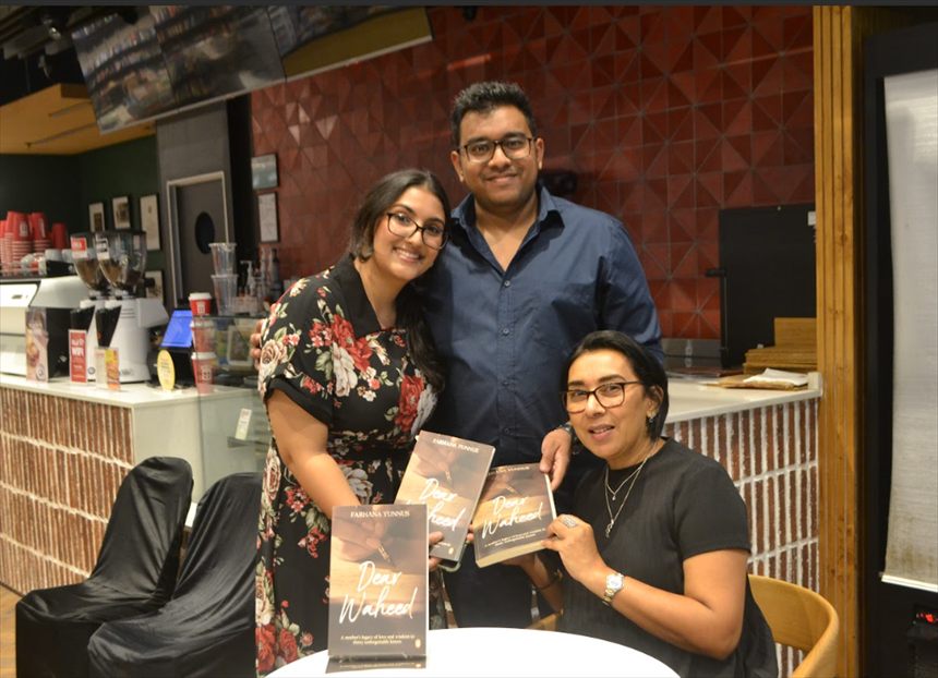 Signing books at the Dear Waheed launch